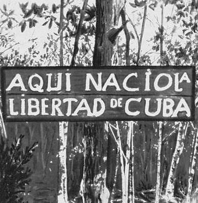 Мыс Колорадо на юге провинции Орьенте. Место, где ежегодно отмечается дата высадки героического отряда с яхты «Гранма» 2 декабря 1956. На лозунге надпись: «Здесь родилась свобода Кубы».