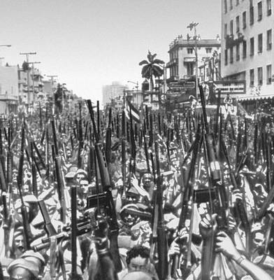 Митинг, посвященный жертвам диверсии в гаванском порту. Здесь впервые был провозглашен лозунг «Родина или смерть». 5 марта 1960.