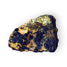 Allanite w-rock Basic calcium iron Rare Earth aluminum silicate near 29 Palms San Bernardino County California 2204.jpg