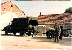 Captured Serb cannon and truck in Siritovci 2.jpg