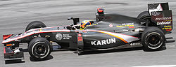Карун Чандхок управляет HRT F110 на Гран-при Малайзии 2010