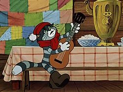 Матроскин играет на гитаре в мультфильме «Зима в Простоквашино»