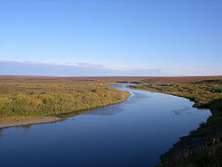 Воркута в месте её пересечения c ж/д Воркута-Инта близ устья реки Юньяха.