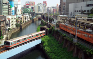 A Tokyo Metro 02 series EMU crosses the Kanda River before arriving at Ochanomizu