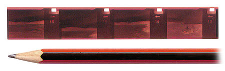 Отрезанная полоска (111х16 мм) с негативными кадрами плёнки типа 110.