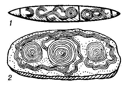 Деревянная (1) и каменная (2) чуринги из Центральной Австралии.