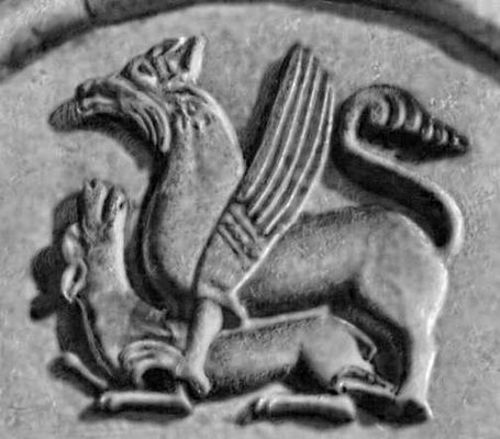 Изображение грифона, когтящего лань, на фасаде церкви Покрова на Нерли. Камень. 1165.