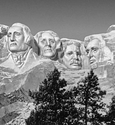 Г. Борглум. Национальный мемориал на г. Рашмор (Южная Докота, США), посвященный президентам Дж. Вашингтону, Т. Джефферсону, Т. Рузвельту и А. Линкольну. 1871—1941.