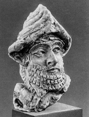 Голова божества из Лагаша. Терракота. 23 в. до н. э. Лувр. Париж.