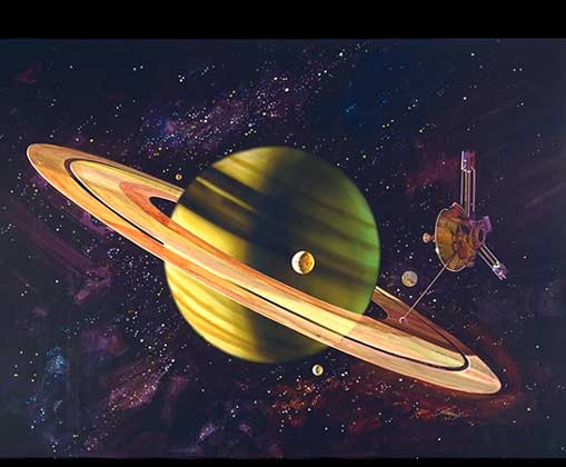 САТУРН и его спутники, сфотографированные при пролете космического зонда Вояджер.