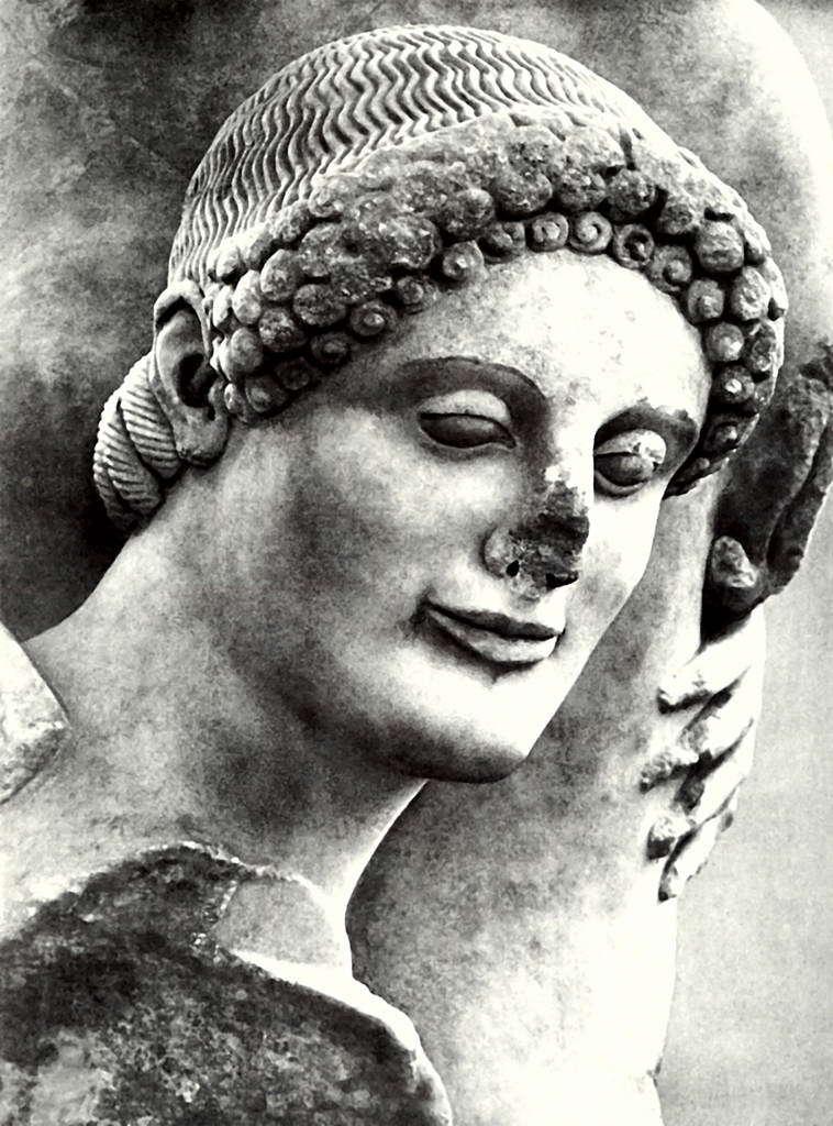 Голова Тесея. Деталь группы западного фронтона храма Аполлона в Эретрии. Около 510 года до н.э.