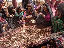220px Afghan rug weavers