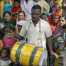 Siddi (Indian of African descent) drummer at a festival.jpg