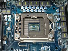 Как называется разъем для процессора. 220px Socket LGA 1366 closed R7309465 wp. Как называется разъем для процессора фото. Как называется разъем для процессора-220px Socket LGA 1366 closed R7309465 wp. картинка Как называется разъем для процессора. картинка 220px Socket LGA 1366 closed R7309465 wp